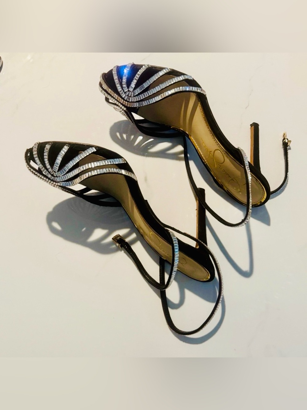 Jessica Simpson black rhinestone strappy heels.